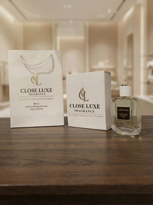 Lush-Eve perfume bottle with branded packaging on a wooden table in a modern setting