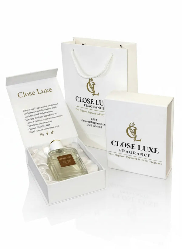 Luxury perfume gift set with Untamed fragrance bottle, elegant box, and branded shopping bag